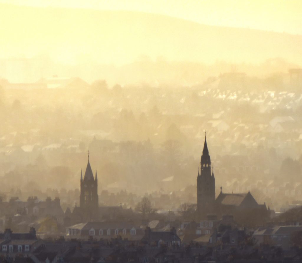 Kirks clear through a hazy sunset looking North West across Aberdeen